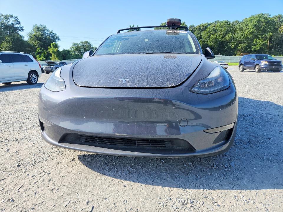 Photo 5 from auction – 2023 TESLA MODEL Y with VIN 7SAYGAEE7PF781557