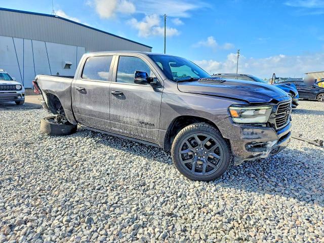 Photo 4 from auction – 2023 RAM 1500 with VIN 1C6RREJT9PN559974