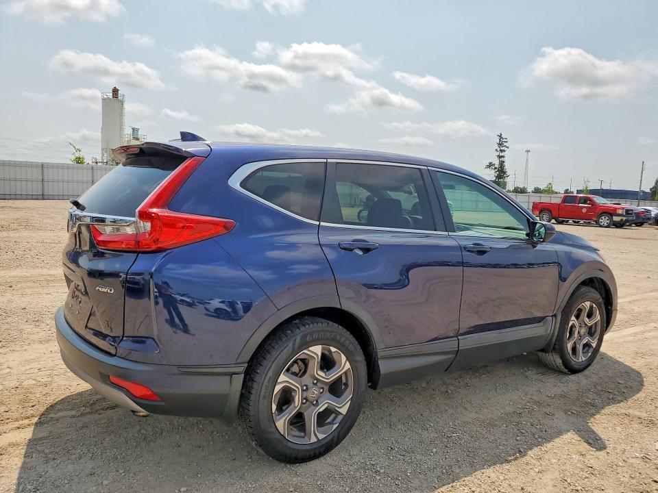 Photo 3 from auction – 2019 HONDA CR-V with VIN 7FARW2H59KE026395