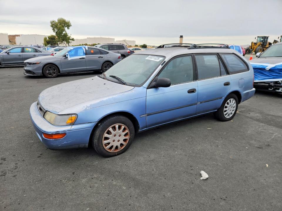 TOYOTA COROLLA 1995 with VIN JT2AE09V7S0087668 - Photo from auction