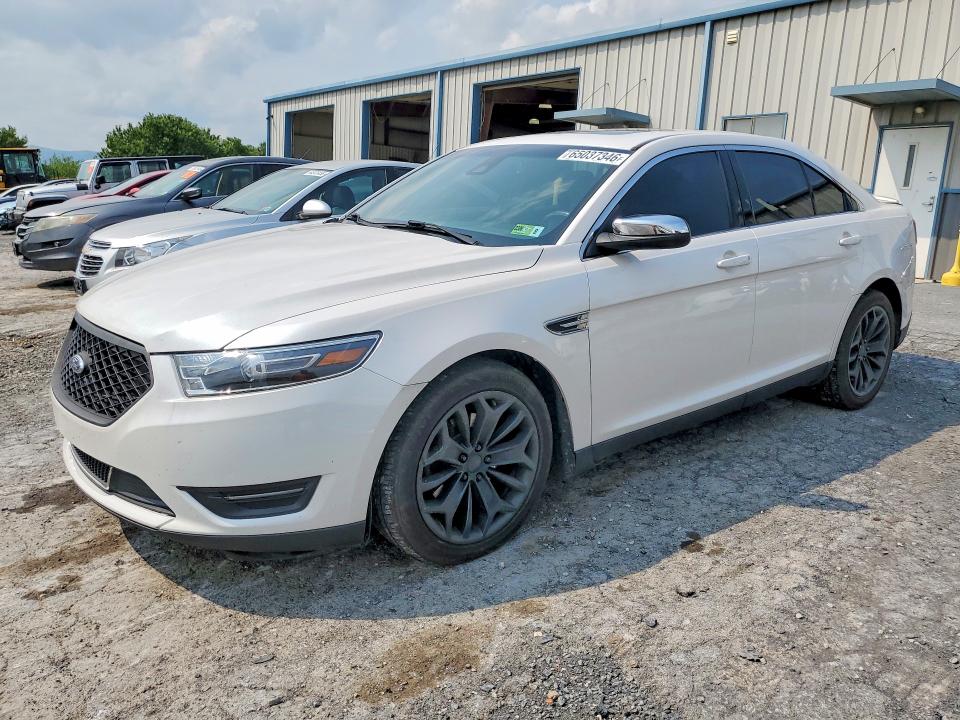 FORD TAURUS 2015 with VIN 1FAHP2J8XFG127312 - Photo from auction