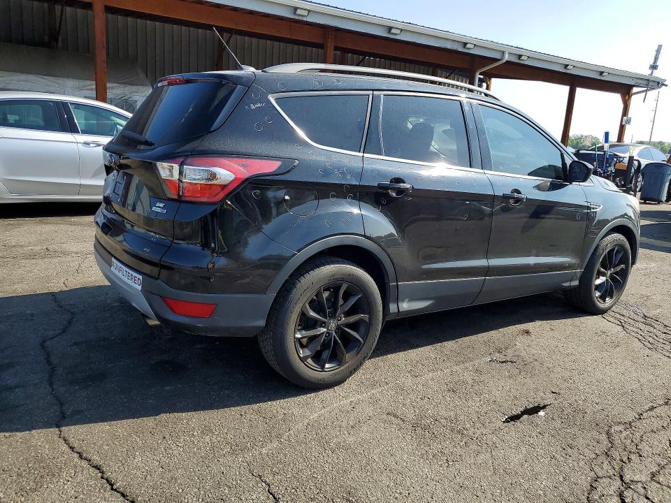 Photo 3 from auction – 2018 FORD ESCAPE with VIN 1FMCU9GD9JUA05041