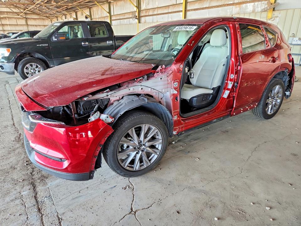 MAZDA CX-5 2019 with VIN JM3KFADM5K1583986 - Photo from auction