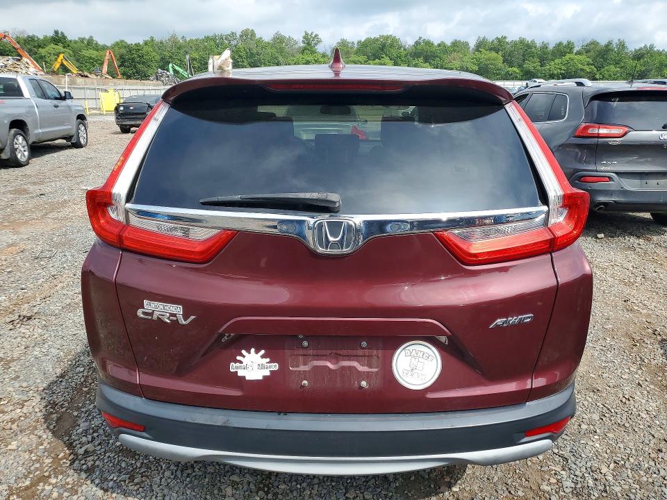 Photo 6 from auction – 2018 HONDA CR-V with VIN 7FARW2H5XJE054642