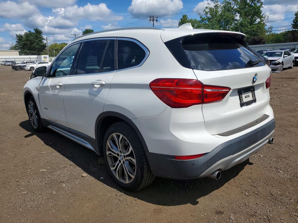 Photo 2 from auction – 2017 BMW X1 with VIN WBXHT3Z35H4A65557