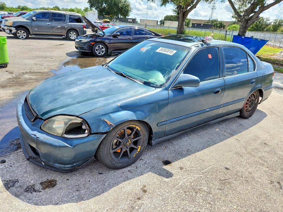 HONDA CIVIC 1997 with VIN 2HGEJ8640VH539184 - Photo from auction
