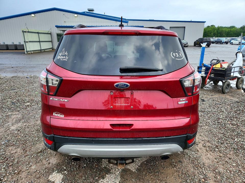 Foto 6 de la subasta – 2017 FORD ESCAPE con VIN 1FMCU9GD1HUD02721