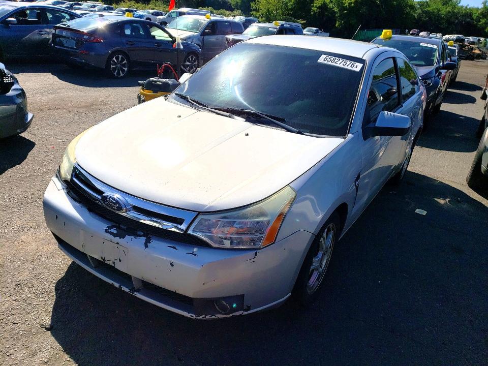 FORD FOCUS 2008 with VIN 1FAHP33N78W219754 - Photo from auction