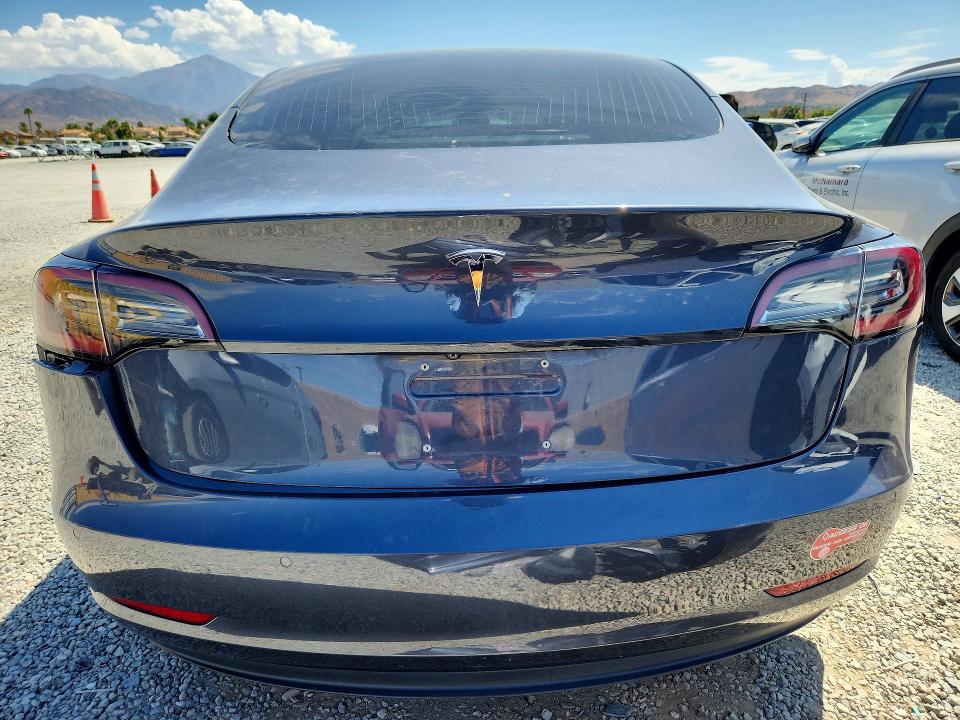 Снимка 6 от търг – 2018 TESLA MODEL 3 с VIN 5YJ3E1EA5JF038512
