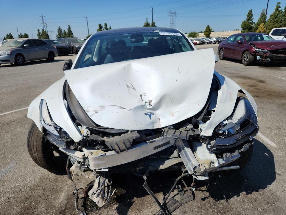 Photo 5 from auction – 2022 TESLA MODEL 3 with VIN 5YJ3E1EB8NF274702
