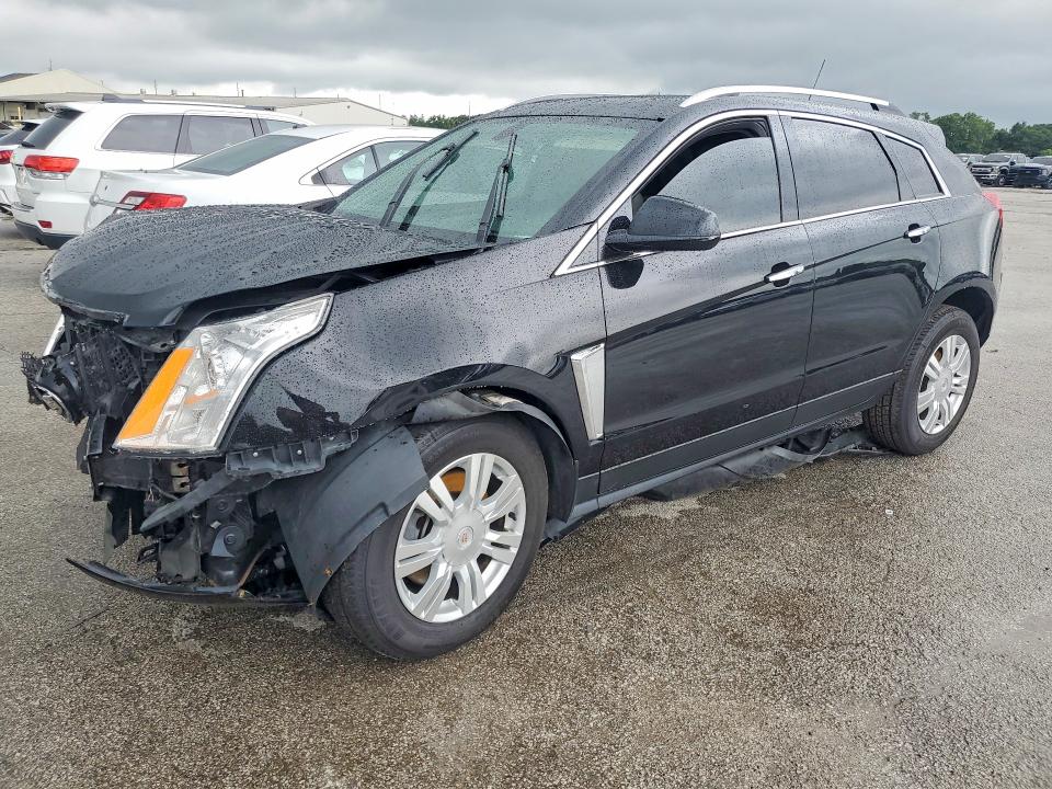 CADILLAC SRX 2015 with VIN 3GYFNBE3XFS555561 - Photo from auction