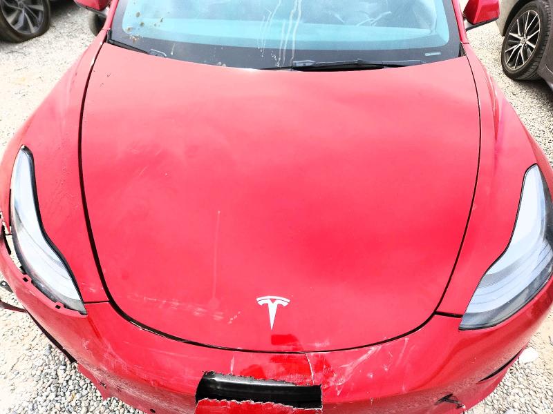 Photo 11 from auction – 2022 TESLA MODEL 3 with VIN 5YJ3E1EB9NF192557