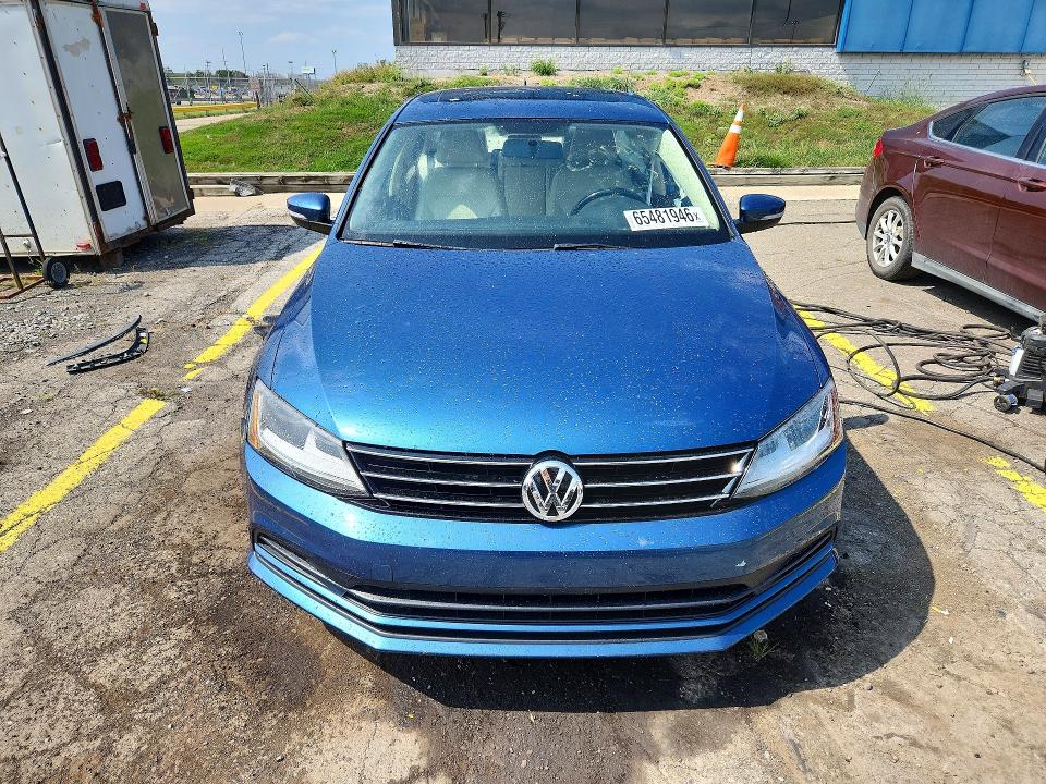 Photo 5 from auction – 2017 VOLKSWAGEN JETTA with VIN 3VWDB7AJ6HM383699