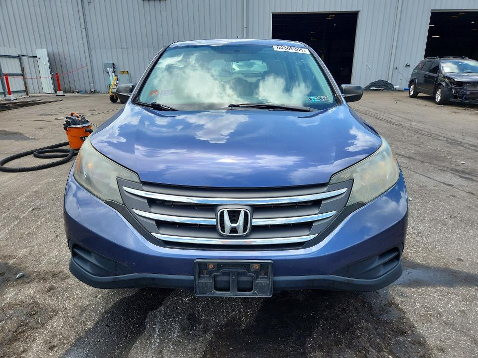 Photo 5 from auction – 2014 HONDA CR-V with VIN 2HKRM4H33EH661095