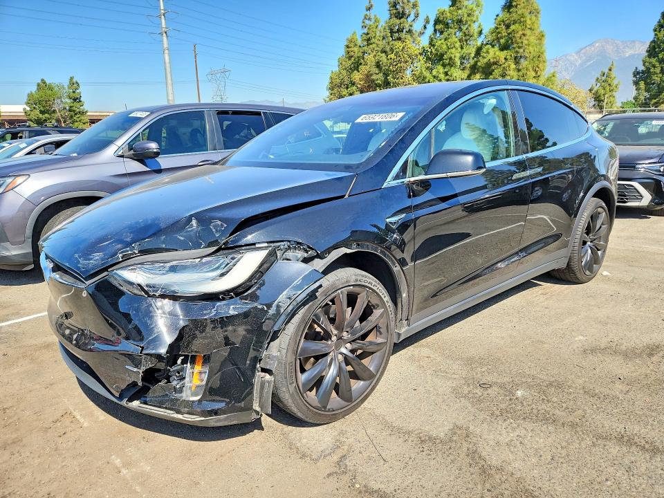 TESLA MODEL X 2020 with VIN 5YJXCAE24LF247579 - Photo from auction