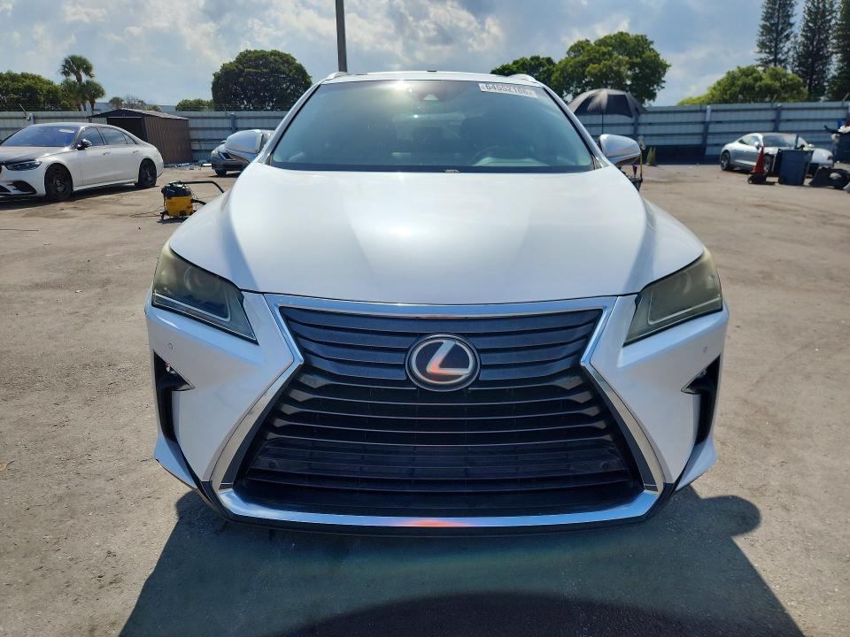 Photo 5 from auction – 2016 LEXUS RX with VIN 2T2ZZMCA9GC016959