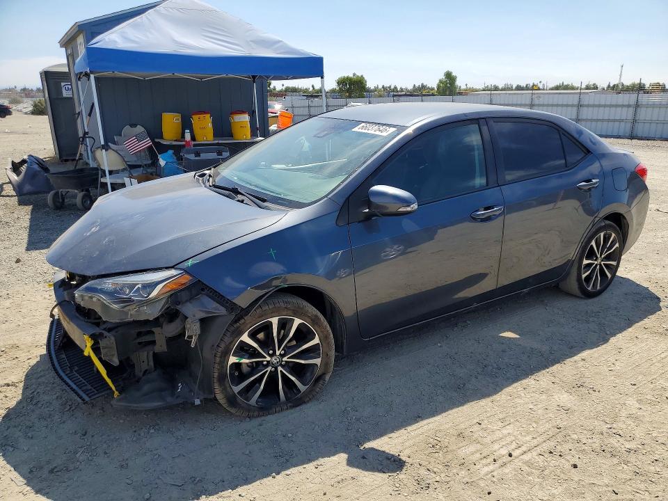 TOYOTA COROLLA 2017 with VIN 5YFBURHE9HP633843 - Photo from auction