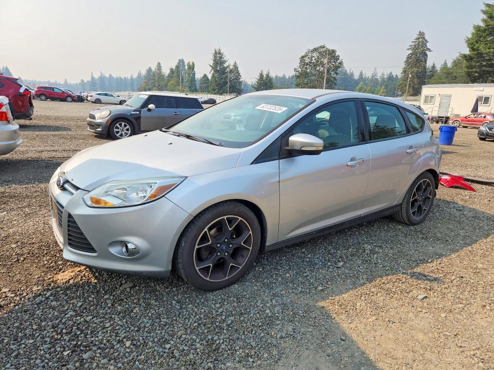 FORD FOCUS 2014 with VIN 1FADP3K29EL300709 - Photo from auction