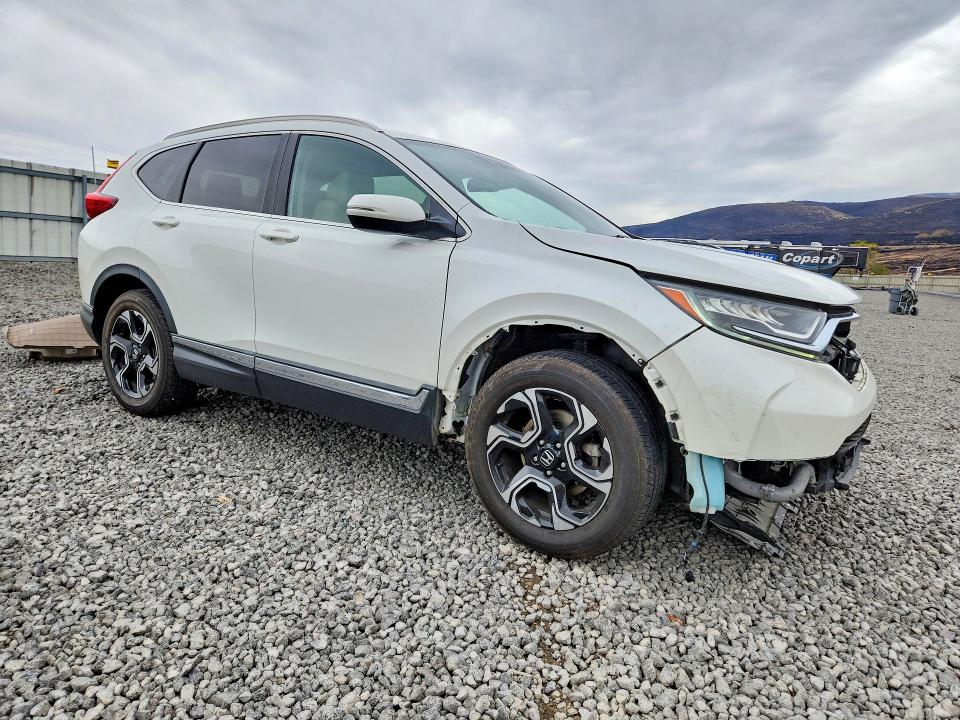 Photo 4 from auction – 2018 HONDA CR-V with VIN 2HKRW2H96JH665199