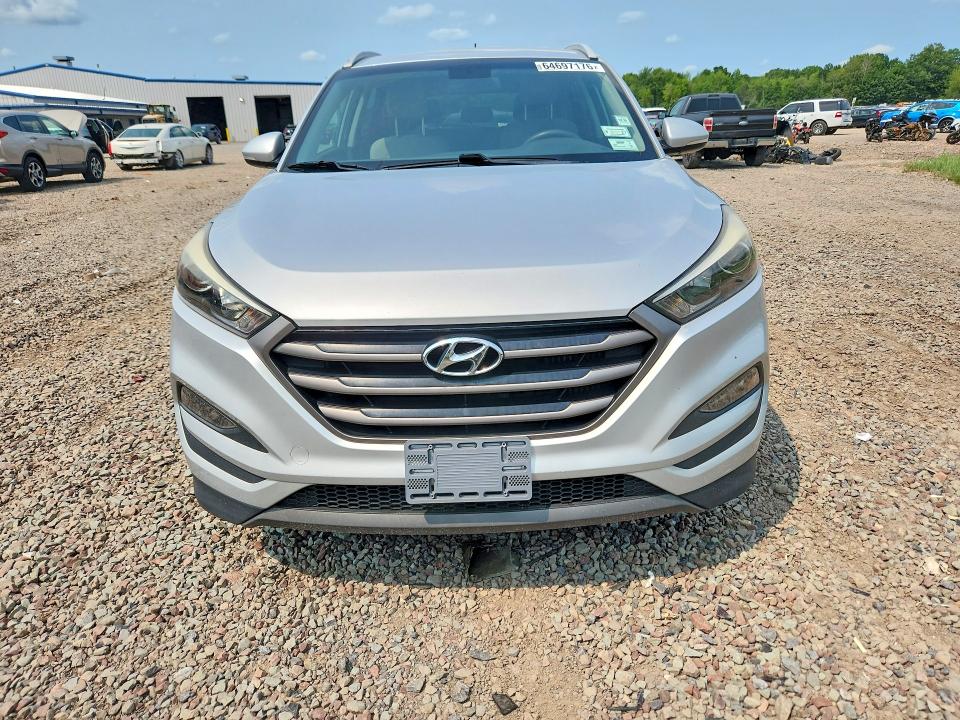 Photo 5 from auction – 2016 HYUNDAI TUCSON with VIN KM8J33A22GU164927