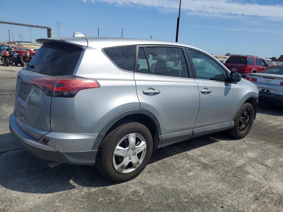 Photo 3 from auction – 2018 TOYOTA RAV4 with VIN 2T3ZFREV4JW474884