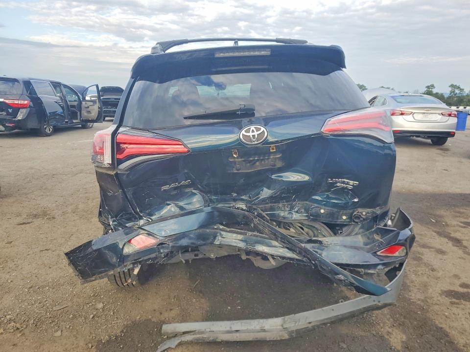 Photo 6 from auction – 2018 TOYOTA RAV4 with VIN 2T3DFREV9JW746274