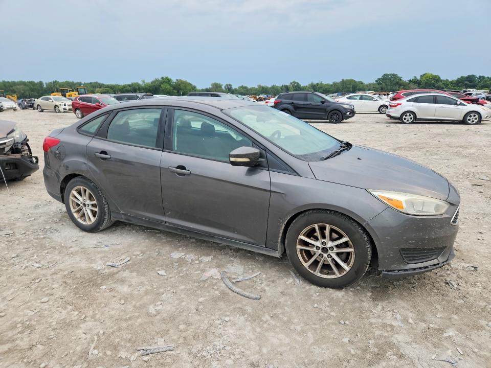 Photo 4 from auction – 2016 FORD FOCUS with VIN 1FADP3F28GL242752
