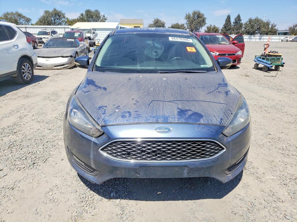 Photo 5 from auction – 2018 FORD FOCUS with VIN 1FADP3H22JL204941