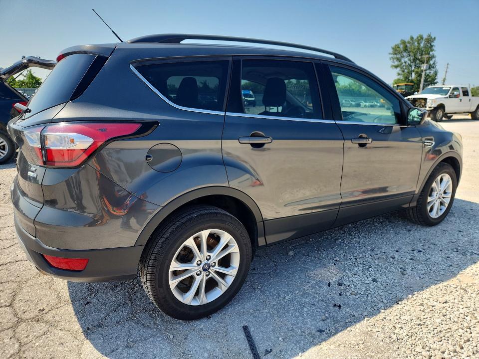 Photo 3 from auction – 2018 FORD ESCAPE with VIN 1FMCU9GD2JUA90997