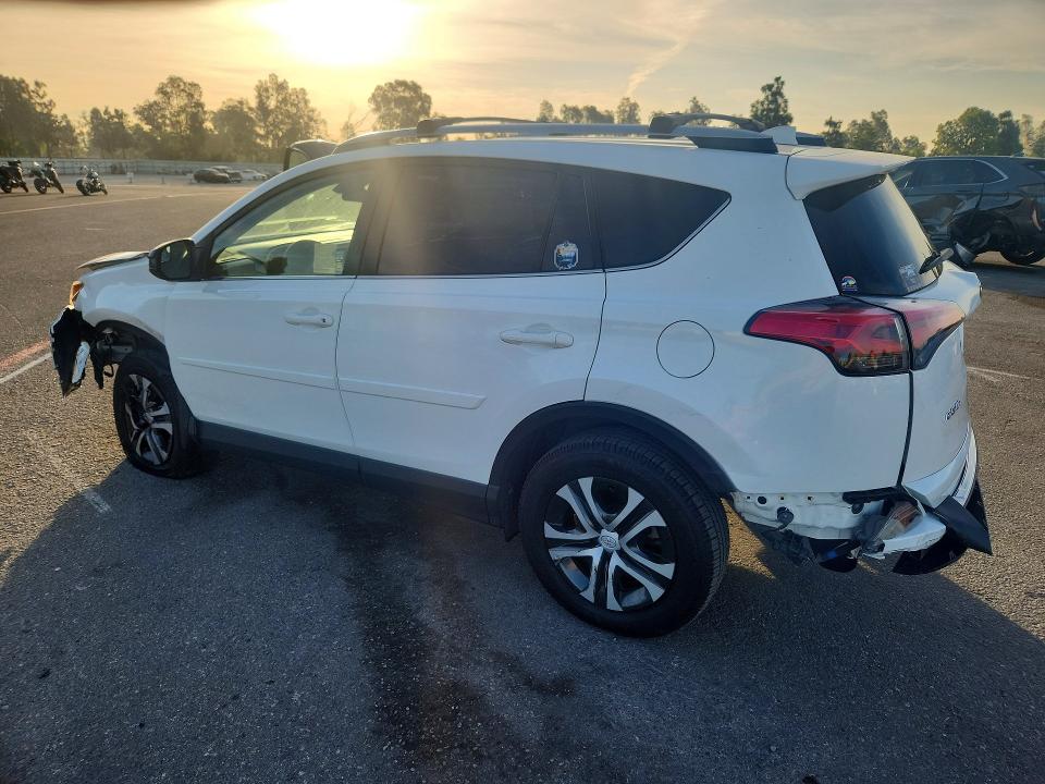 Photo 2 from auction – 2018 TOYOTA RAV4 with VIN JTMZFREVXJJ750936