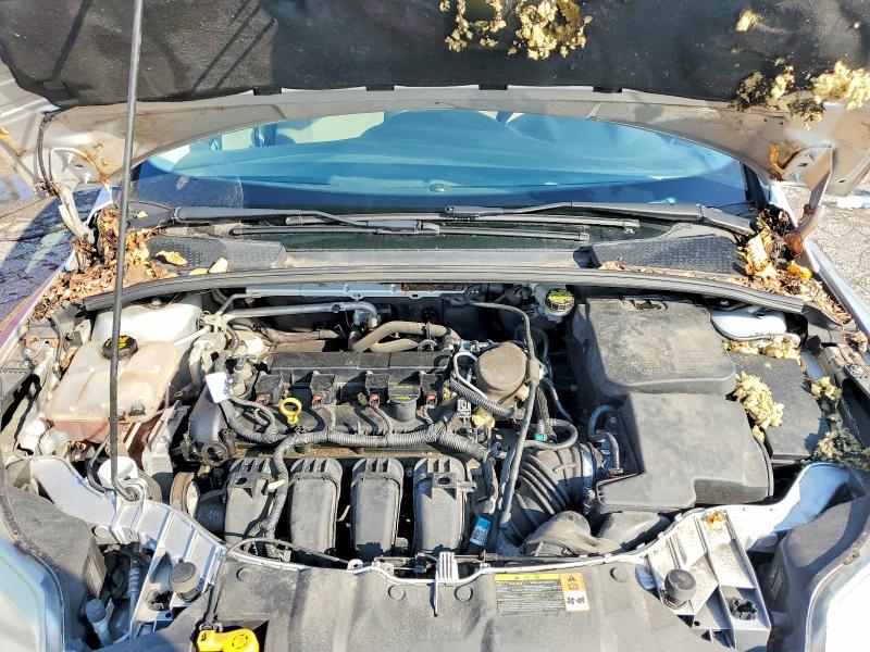 Photo 11 from auction – 2014 FORD FOCUS with VIN 1FADP3F22EL216578