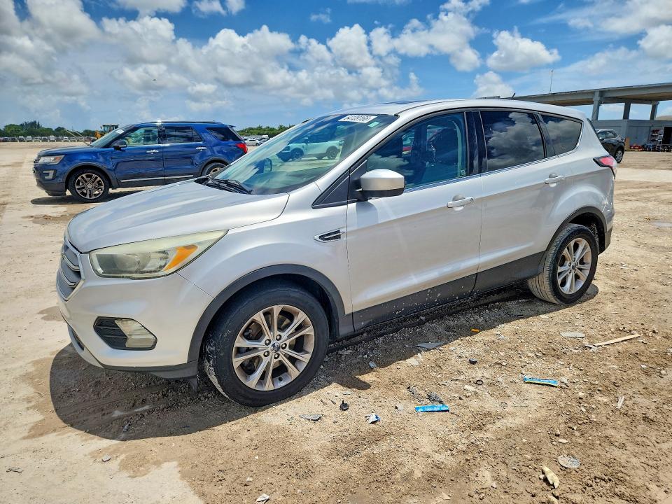 FORD ESCAPE 2017 with VIN 1FMCU9G95HUD44661 - Photo from auction