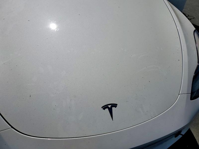 Photo 11 from auction – 2023 TESLA MODEL Y with VIN 7SAYGDEE9PF621925