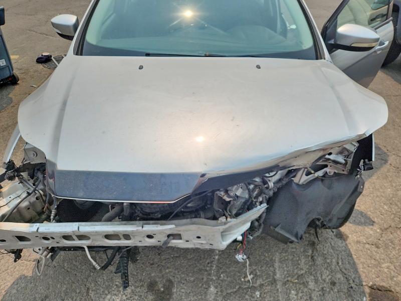 Photo 11 from auction – 2014 FORD FOCUS with VIN 1FADP3F24EL301664