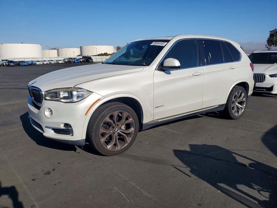 BMW X5 2014 with VIN 5UXKR0C5XE0K50471 - Photo from auction