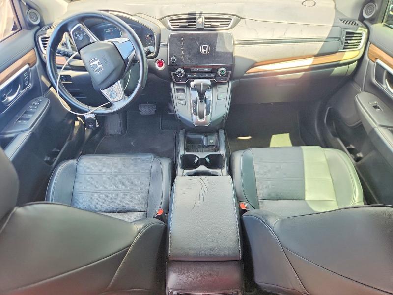 Photo 8 from auction – 2018 HONDA CR-V with VIN 7FARW2H93JE038530