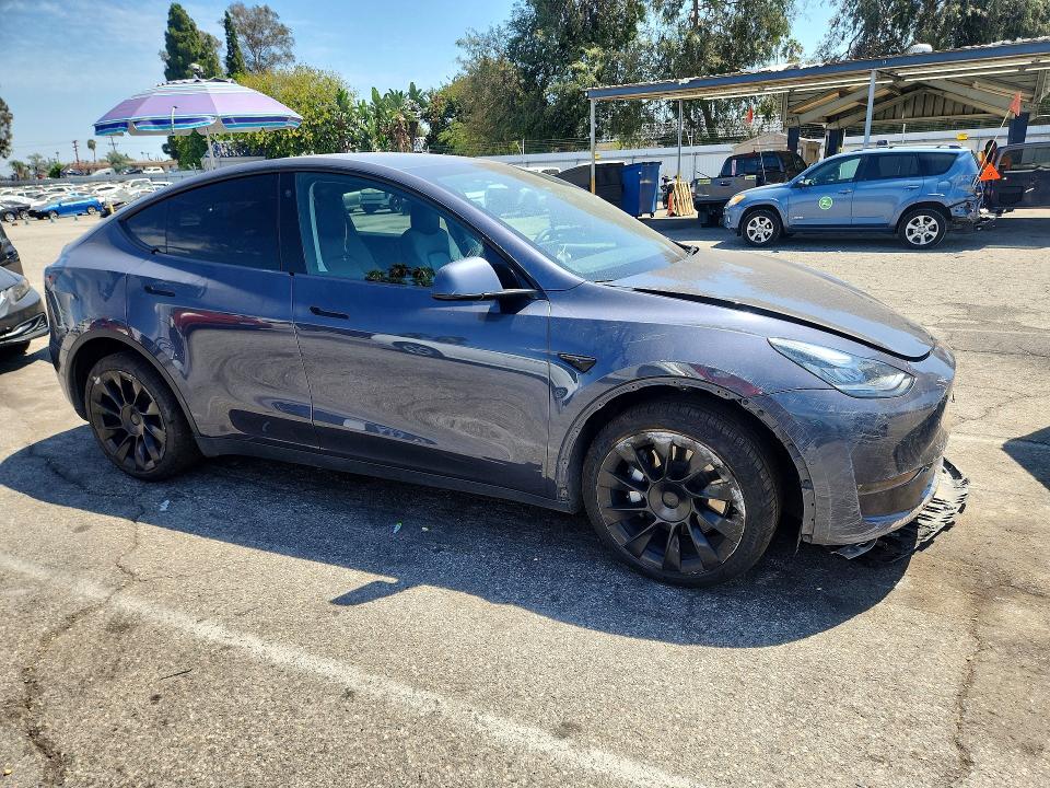 Photo 4 from auction – 2022 TESLA MODEL Y with VIN 7SAYGDEE7NF512148