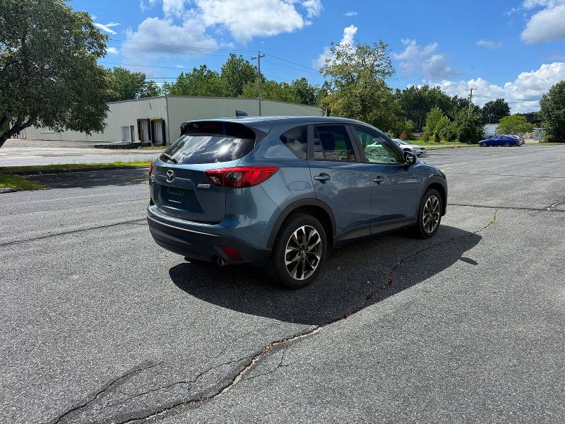 Photo 4 from auction – 2016 MAZDA CX-5 with VIN JM3KE4DY6G0655895