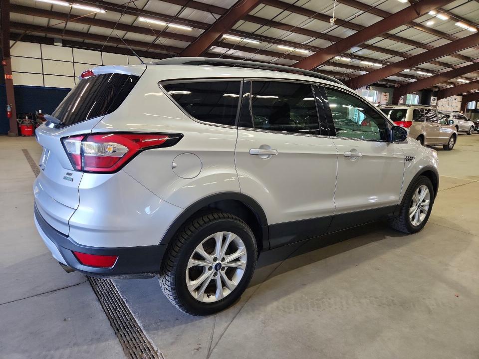 Photo 3 from auction – 2018 FORD ESCAPE with VIN 1FMCU0GD1JUB61845