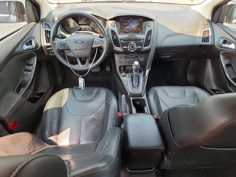 Photo 8 from auction – 2015 FORD FOCUS with VIN 1FADP3J24FL232838