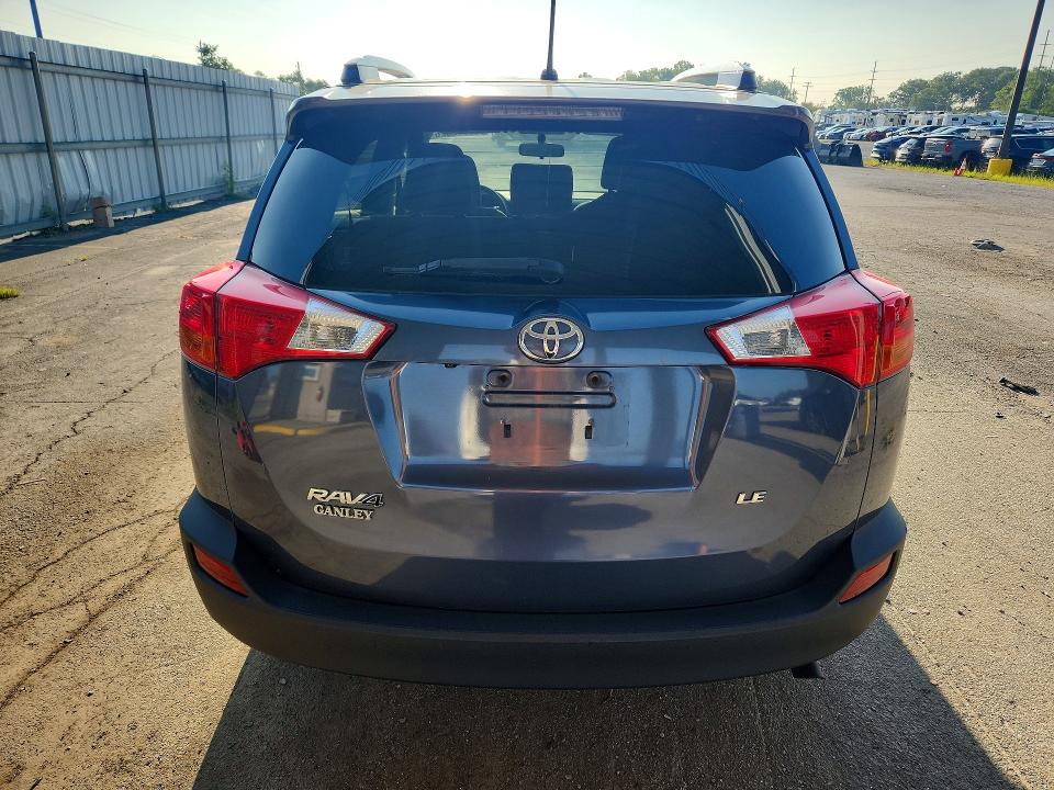 Photo 6 from auction – 2014 TOYOTA RAV4 with VIN JTMZFREV9ED038549