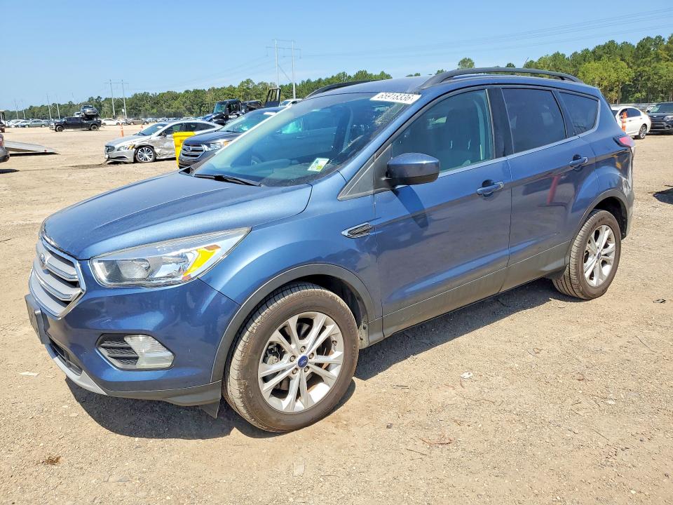 FORD ESCAPE 2018 with VIN 1FMCU9GD8JUB93745 - Photo from auction