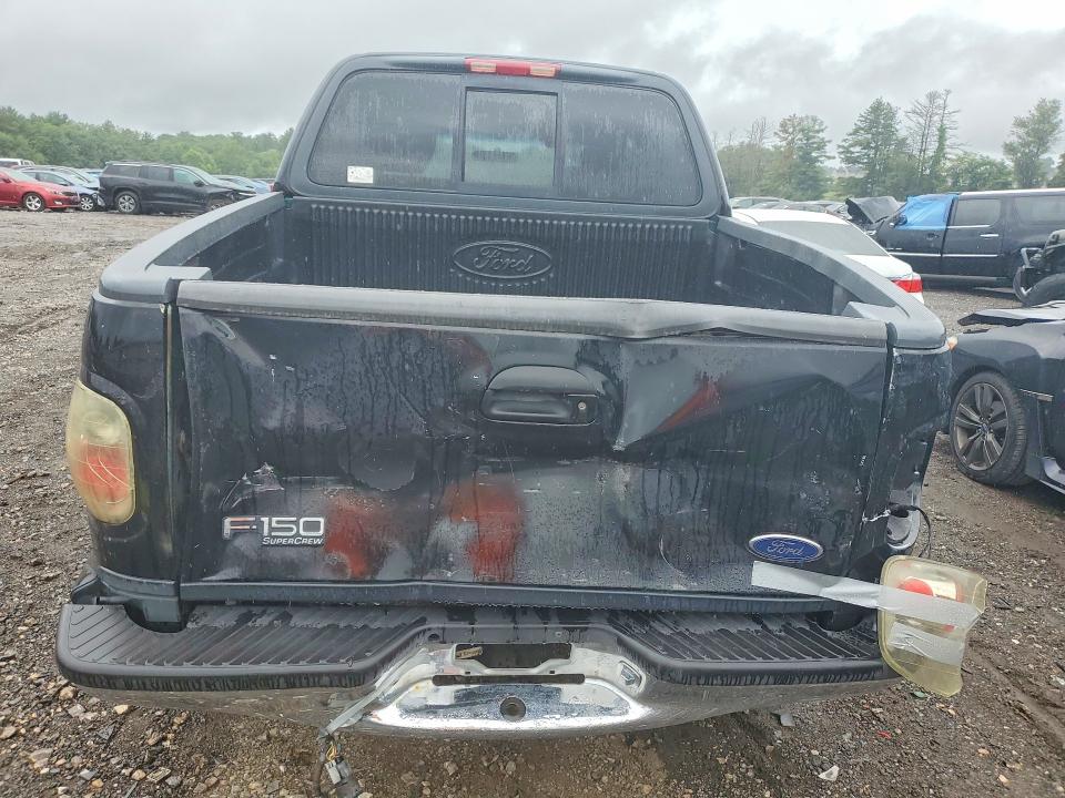Photo 6 from auction – 2003 FORD F150 with VIN 1FTRW08643KD26228