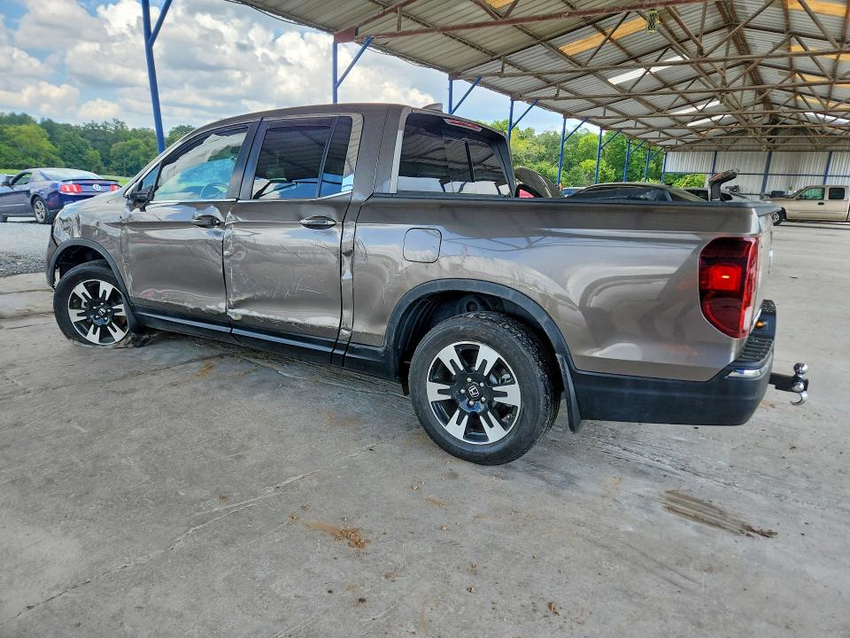 Photo 2 from auction – 2020 HONDA RIDGELINE with VIN 5FPYK3F58LB017742