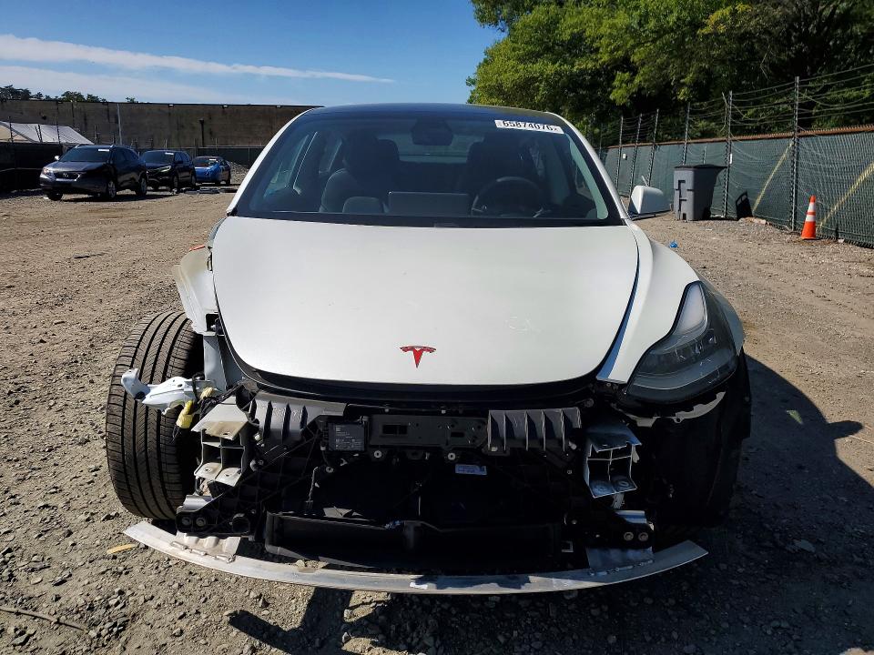 Photo 5 from auction – 2020 TESLA MODEL 3 with VIN 5YJ3E1EA6LF504385