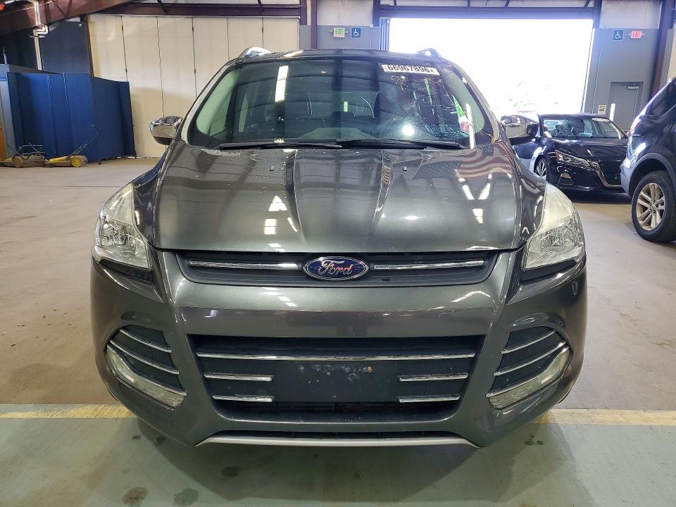 Photo 5 from auction – 2015 FORD ESCAPE with VIN 1FMCU9G98FUA56517