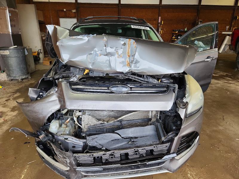 Photo 12 from auction – 2013 FORD ESCAPE with VIN 1FMCU9HX6DUD30761