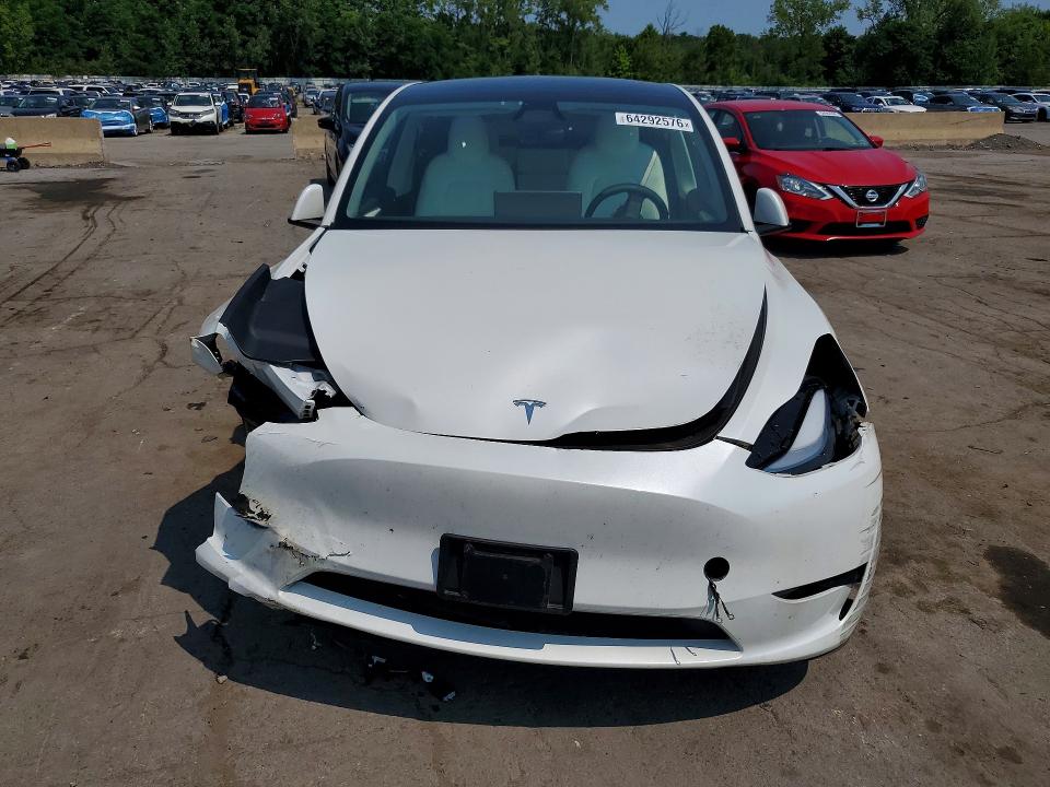 Photo 5 from auction – 2025 TESLA MODEL Y with VIN 7SAYGAEE7SF288311