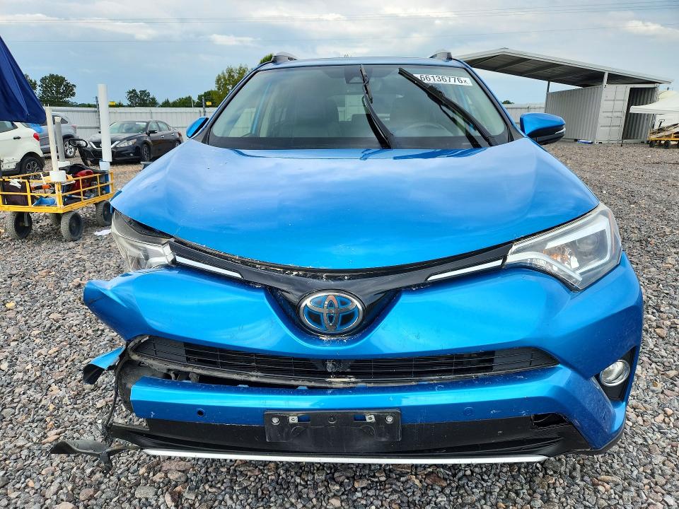 Photo 5 from auction – 2016 TOYOTA RAV4 HV with VIN JTMDJREV5GD046479