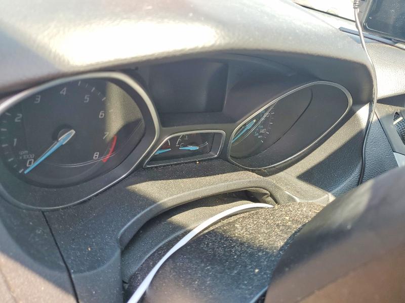 Photo 9 from auction – 2014 FORD FOCUS with VIN 1FADP3F20EL129231